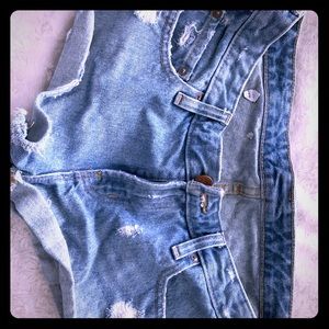 Distressed high rise blue jean shorts